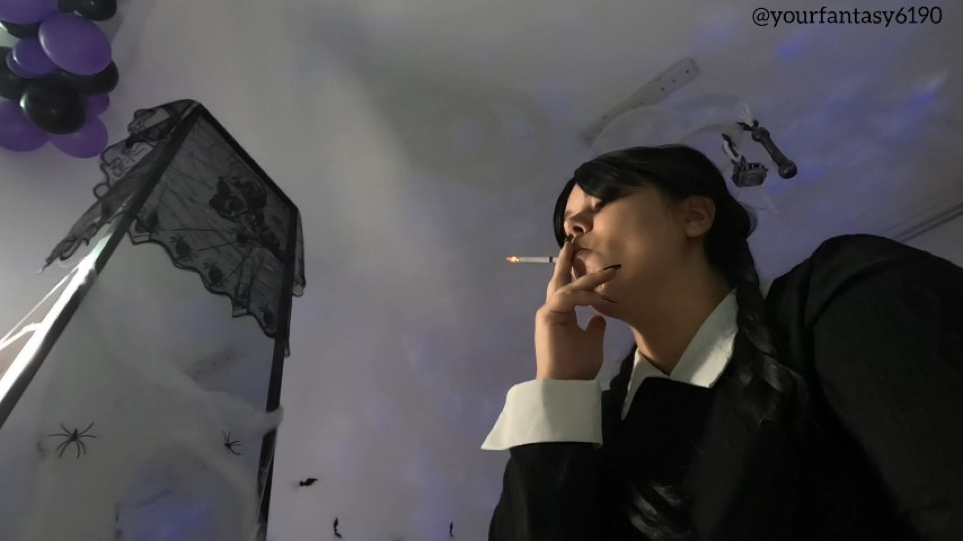 Wednsday smoking a cigarette close-up