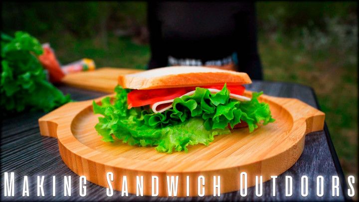 Solo Camping Girl - Ponytail Brunette Makes Sandwich Outdoor