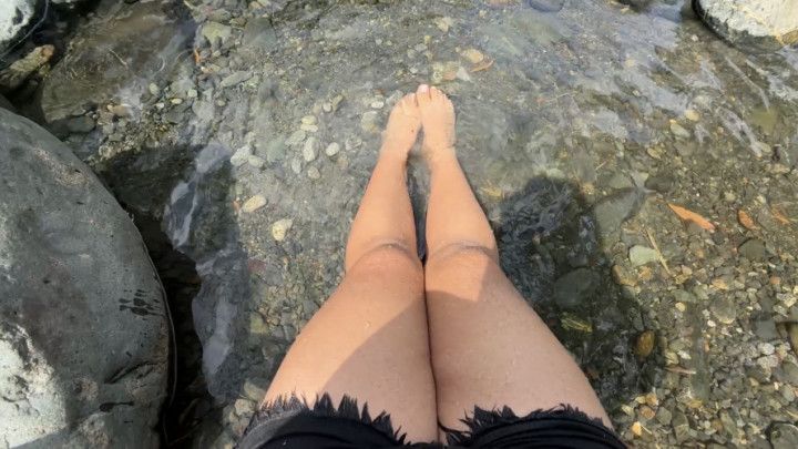 Feet in the river
