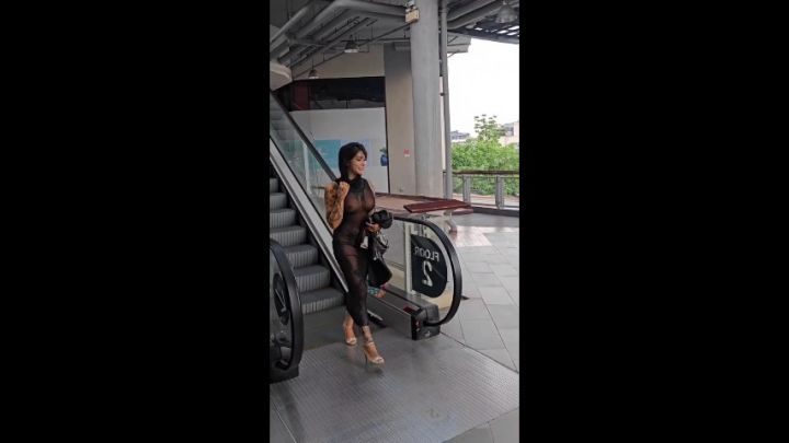 Public Flashing in black transparent dress