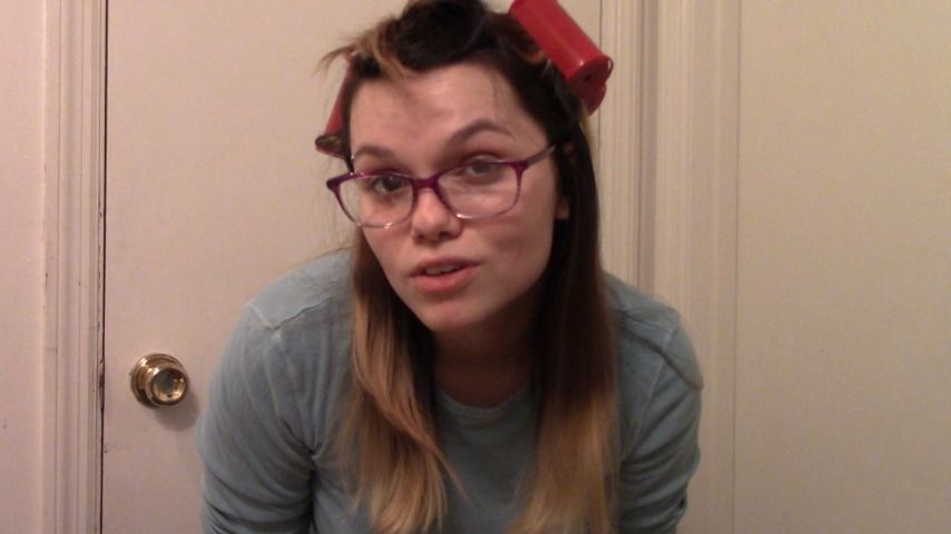 Putting foam curlers in my hair