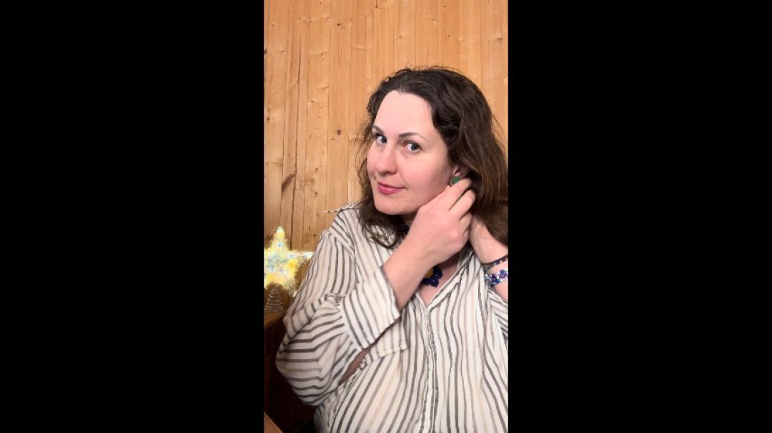 Trying different earrings