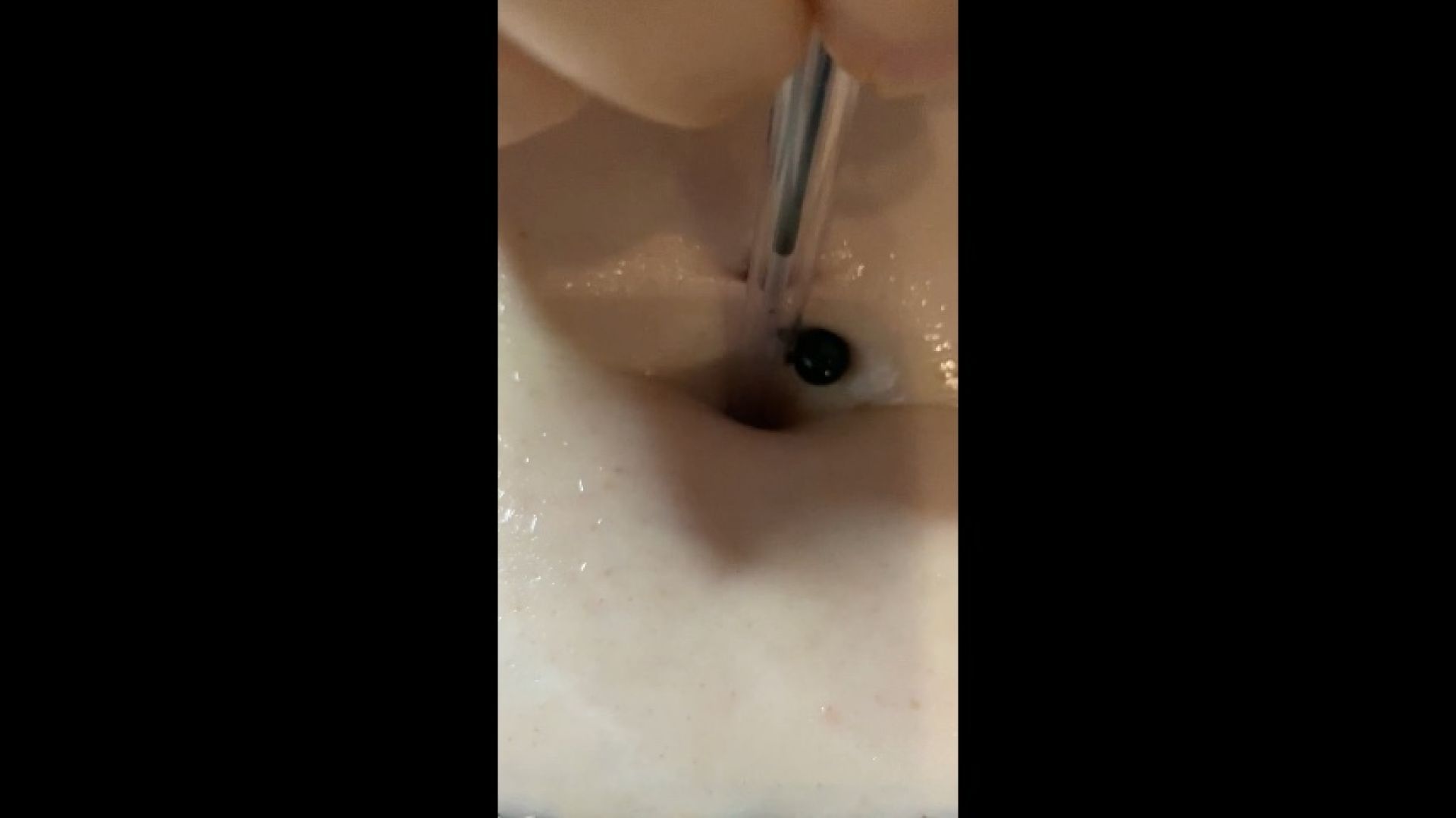 Oiled belly button play