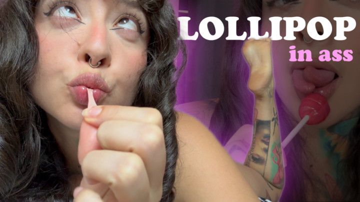 Girl with split tongue licks a lollipop and puts in ass