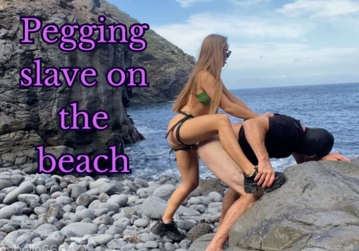 Hard and deep pegging slave on Tenerifa's beach