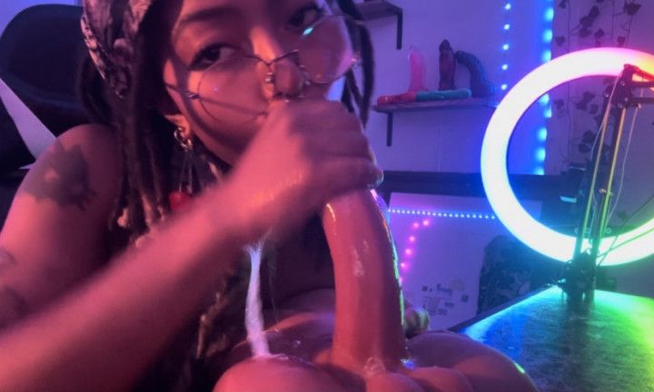 Girl with glasses gets sloppy on toy