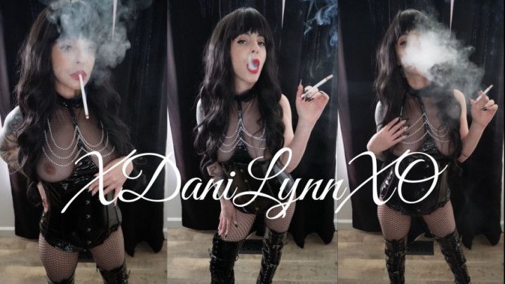 Smoking VS120s Wearing PVC Corset and Thigh High Boots