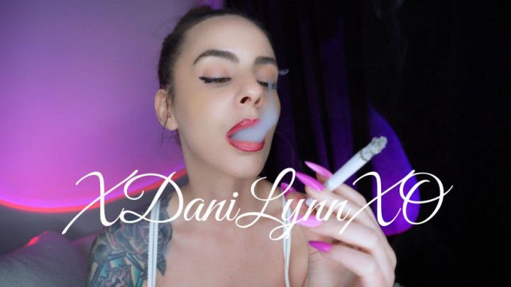 Smoking Closeup with Pink and Purple Nails