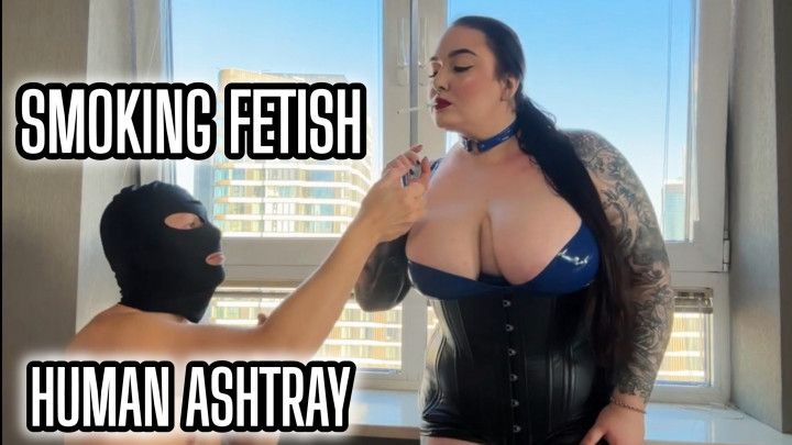 Latex Goddess smoking and using her human ashtray