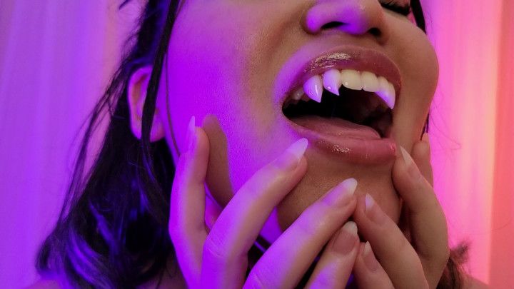 The Vampire's Sharp Teeth and Long Nails