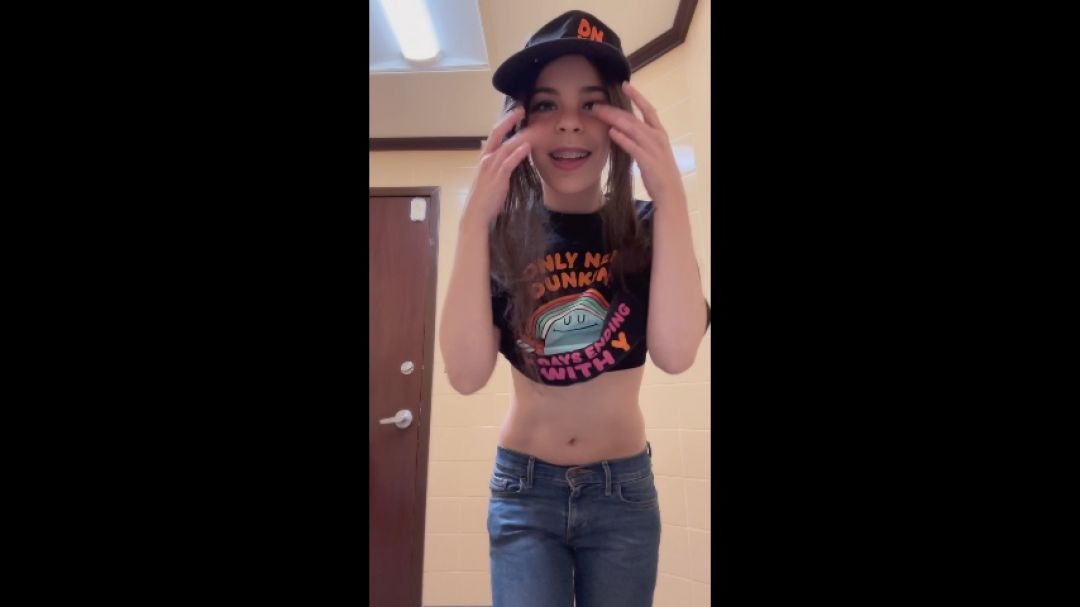 Cute brace-faced teen strips AT donut shop