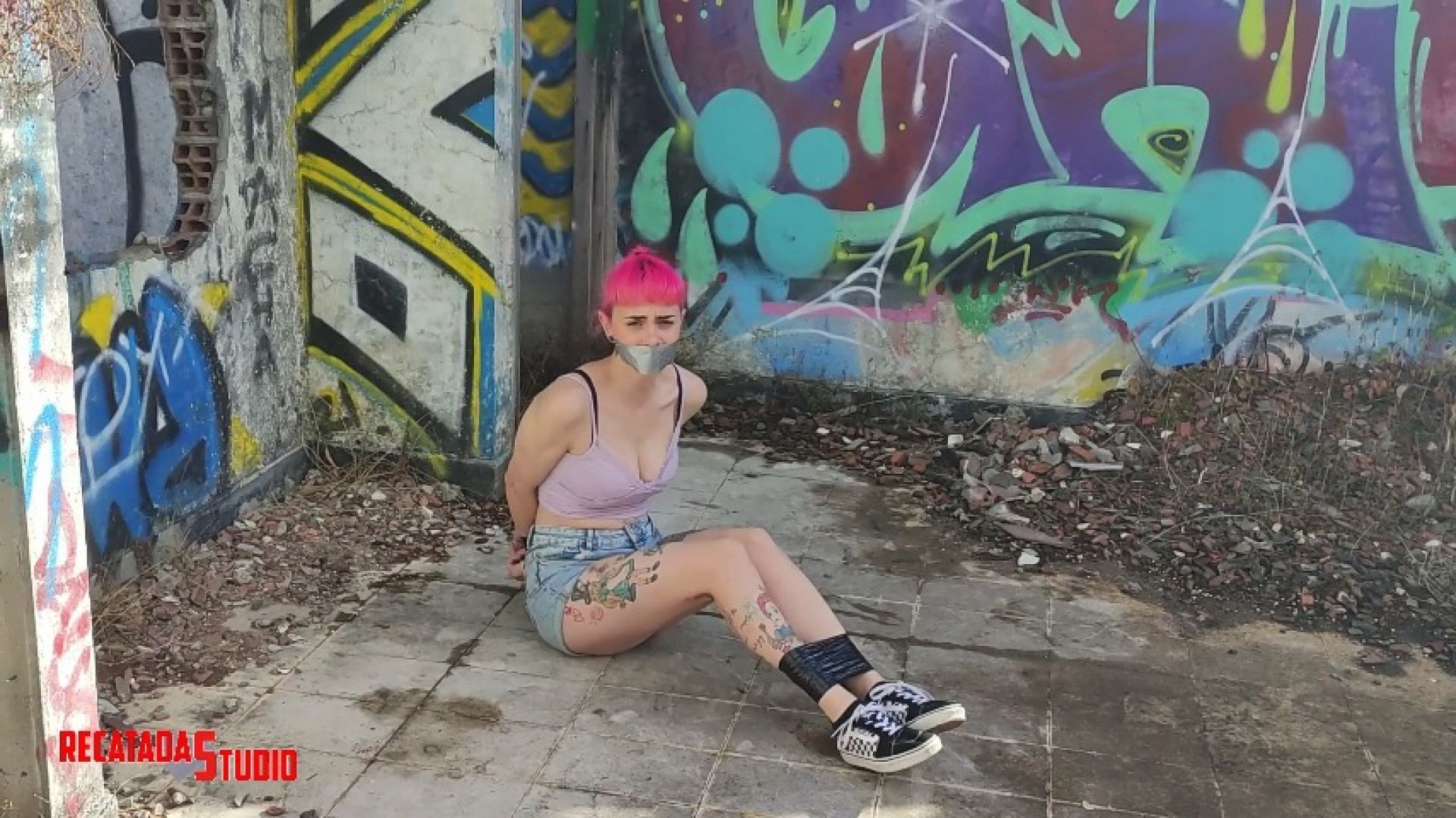 Girl bound and gagged outside