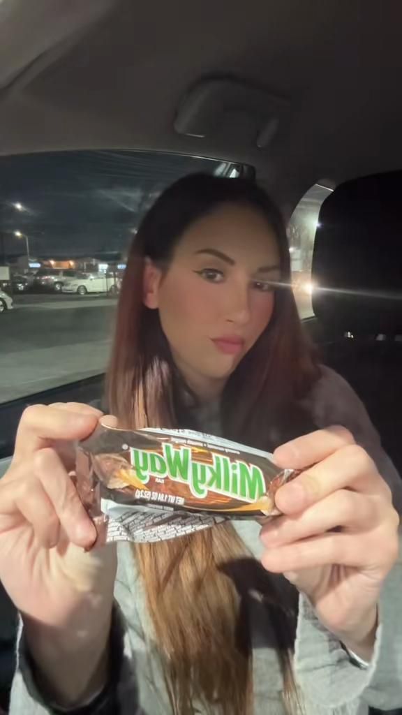 Eating a Milky way in the Car