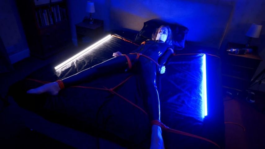 Catsuited super spy captive