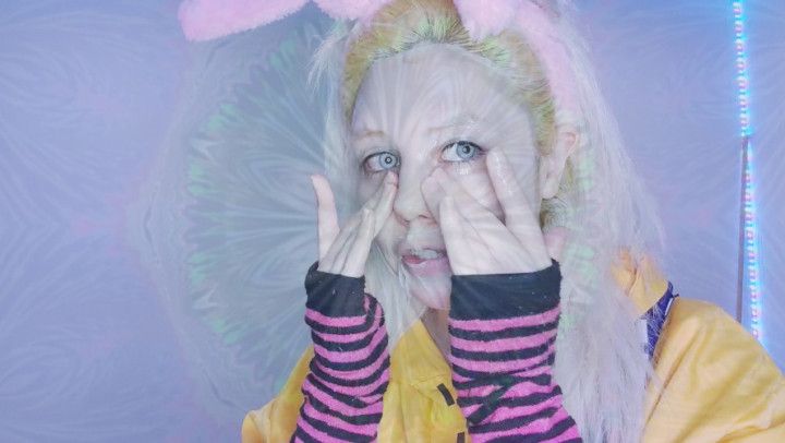 Lady Bunny cleaning her face with hands