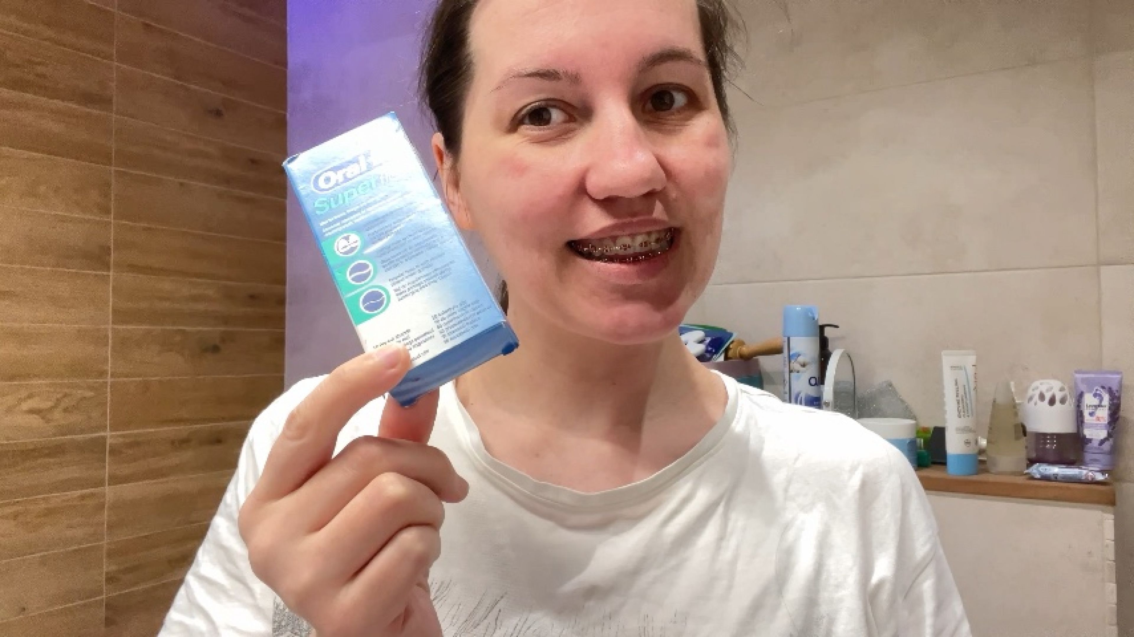 Flossing your teeth with braces