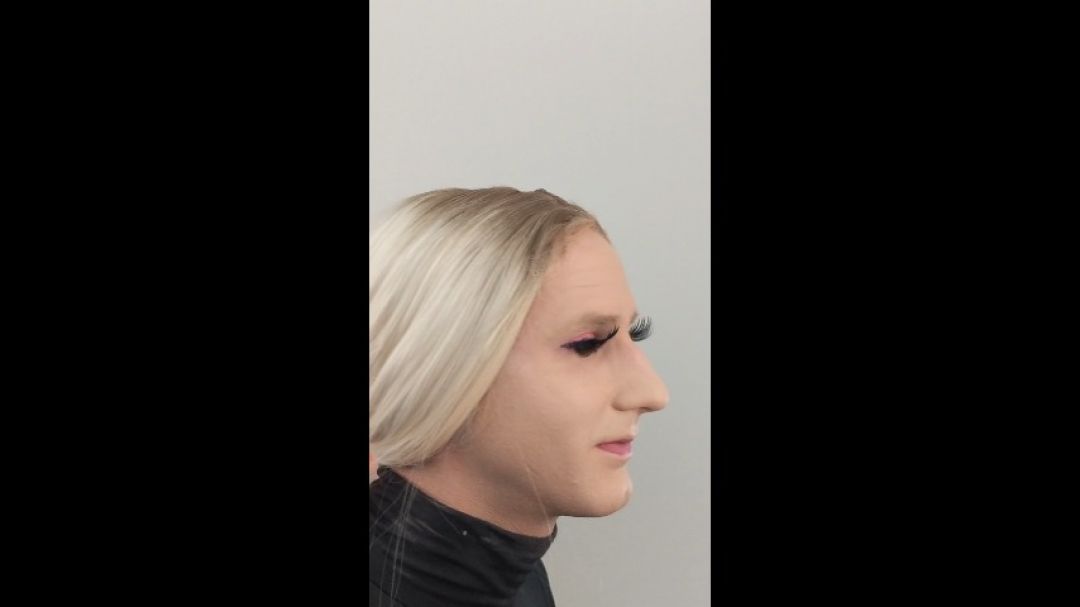 Crossdresser Doing Fake Eyelashes