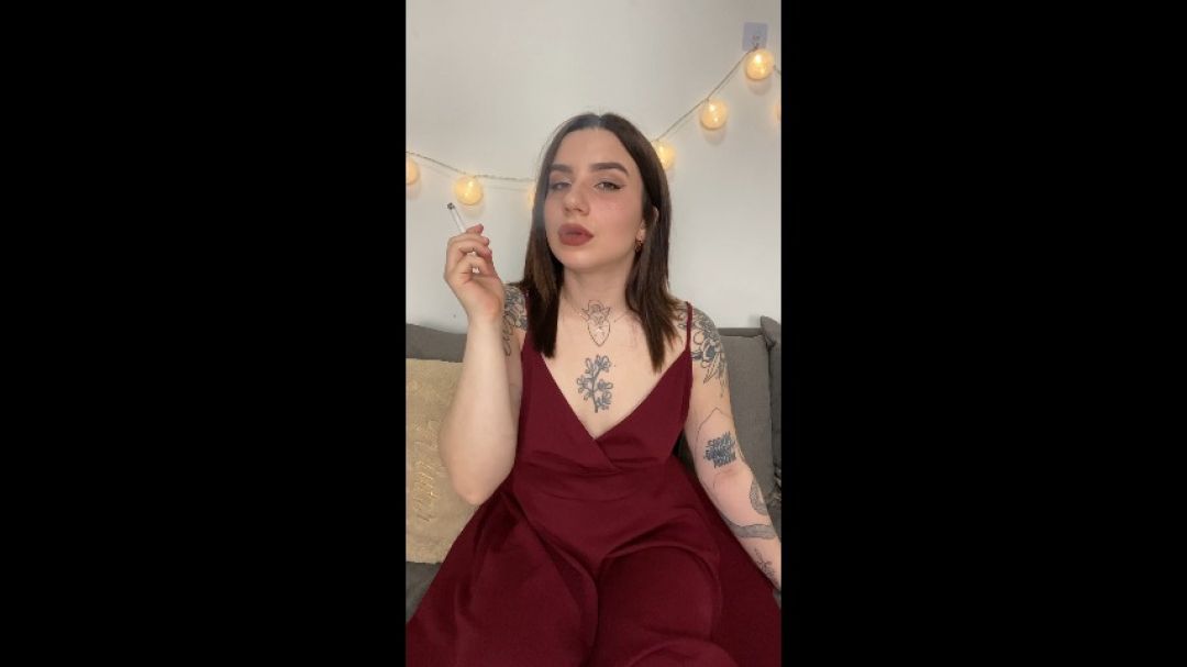 Tattooed Smoking Model