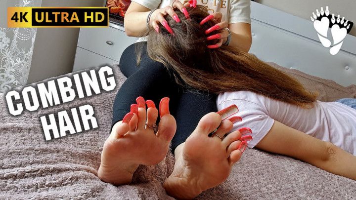 Combing hair with my long nails