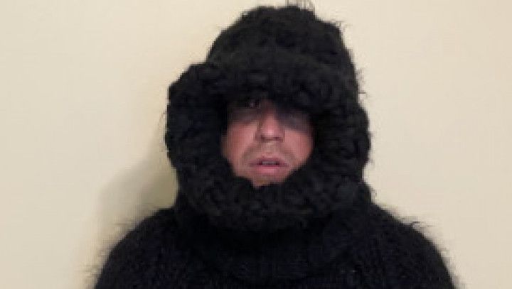 Sweater gimp sucks cock in chastity