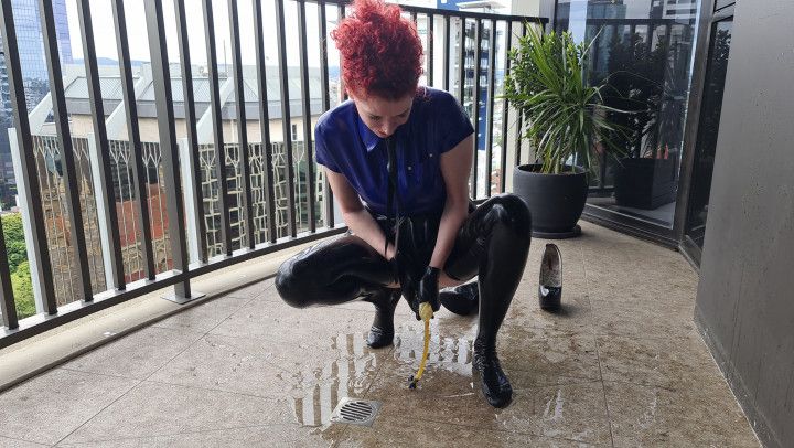 Pissing in my latex piss bag pants