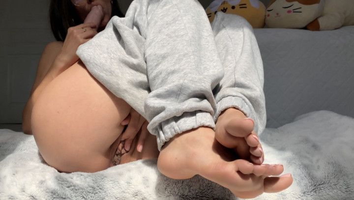 Shy girl pleasuring herself with Dildo