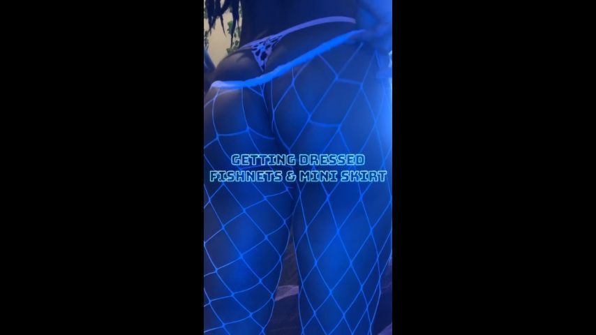 Putting on fishnets and mini skirt