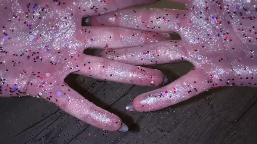 Shiny palms, hands with glitter