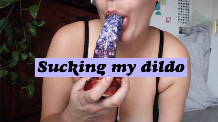 Sucking on my dildo