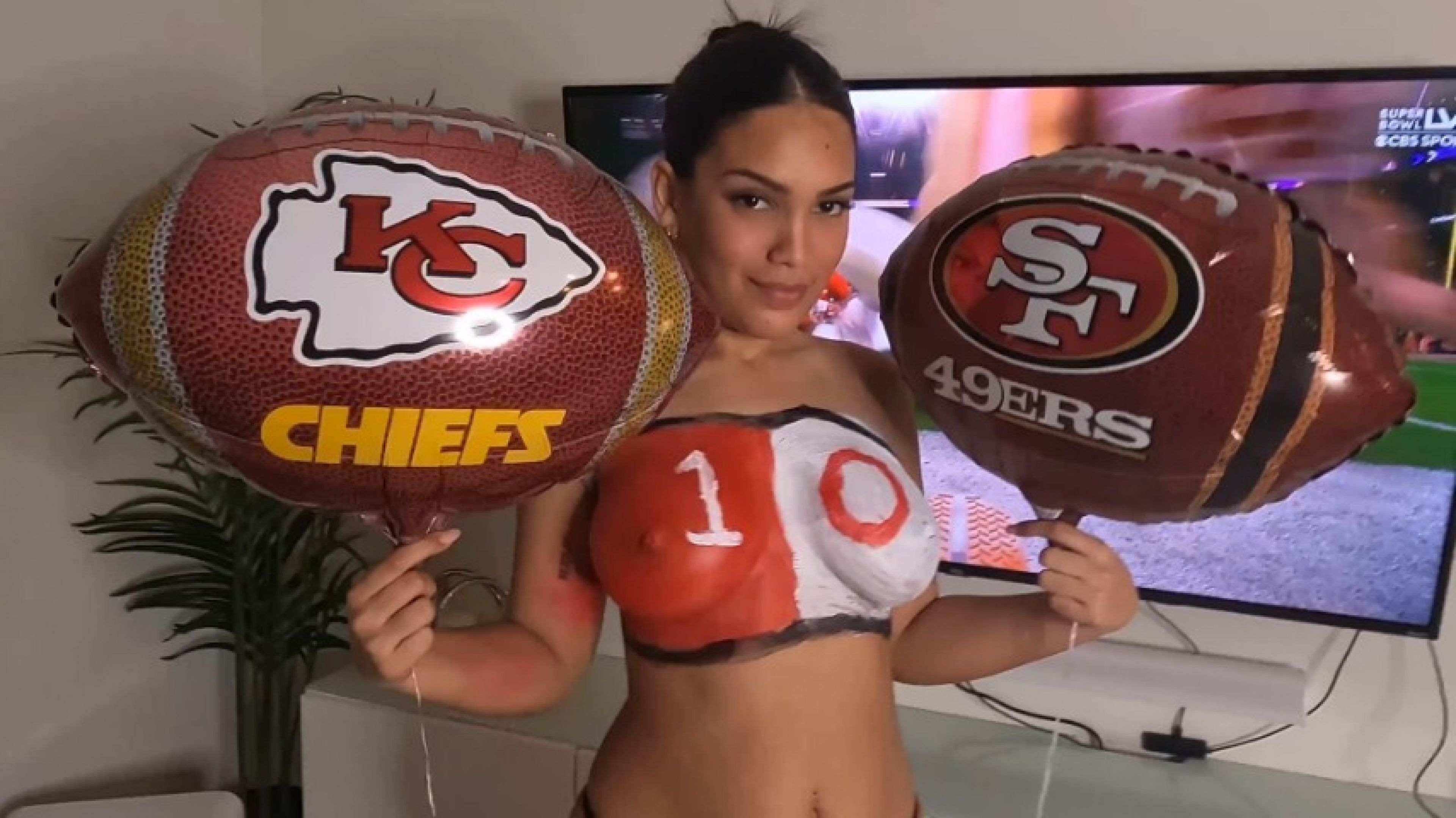 Superbowl slut in body paint gets fucked hard