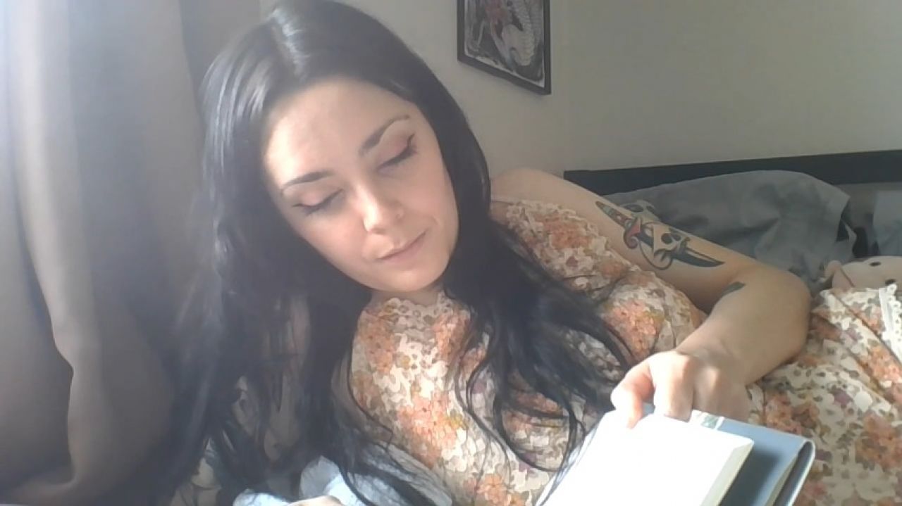 Silently Reading in bed in Cute Lingerie