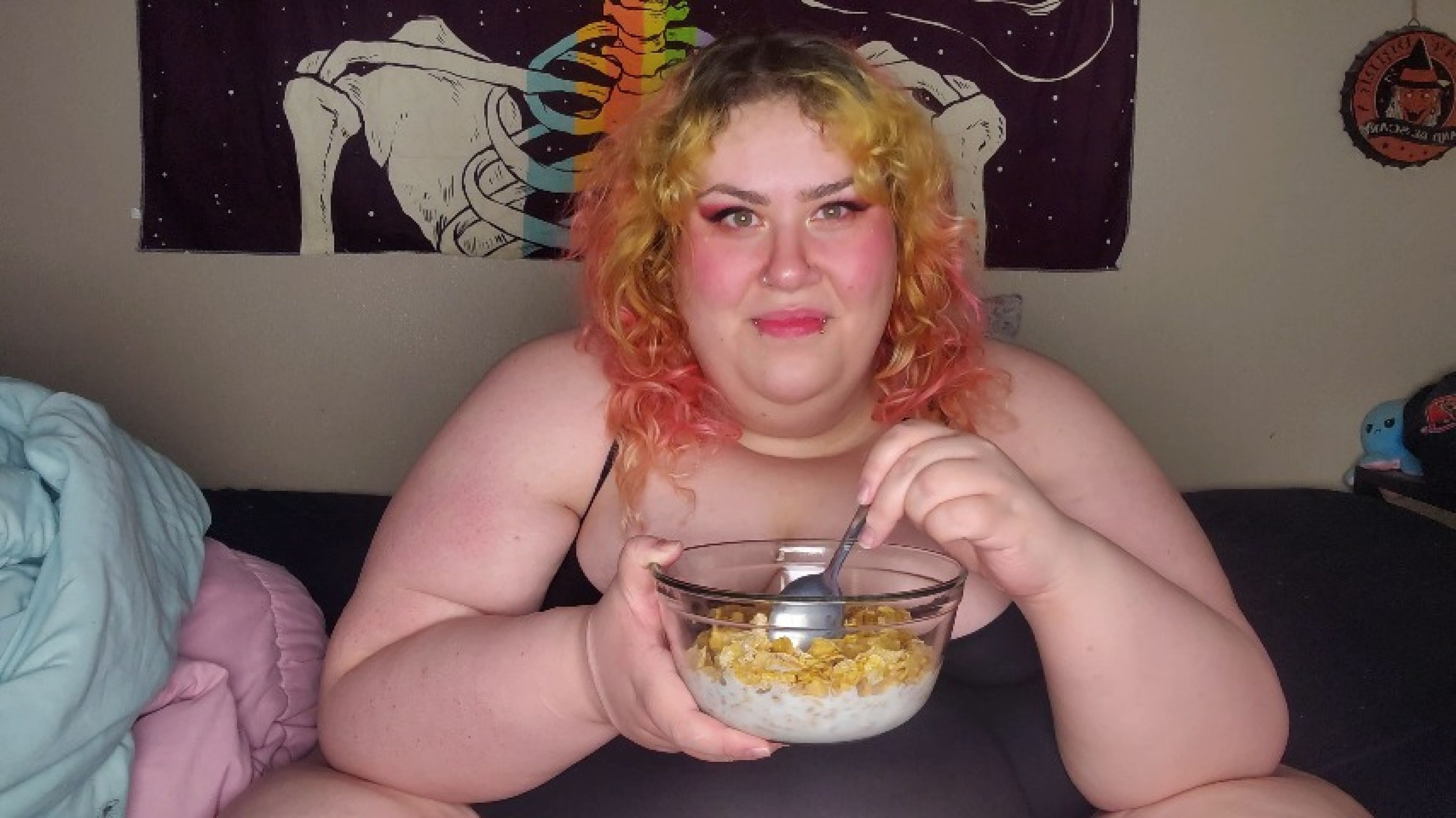 Fat woman eating frosted flakes