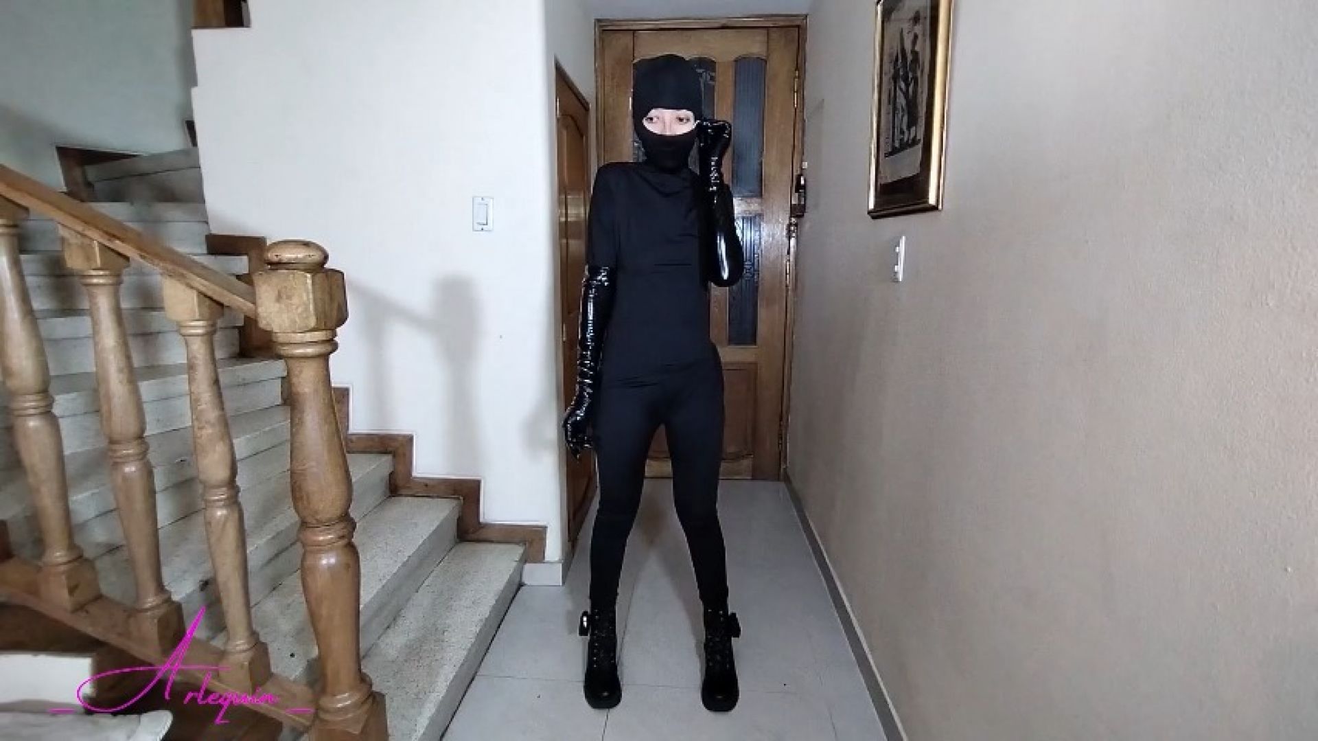 Thief catsuit sneaking to steal the diamond at home alone