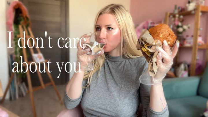 Ignoring you and eating the hamburger