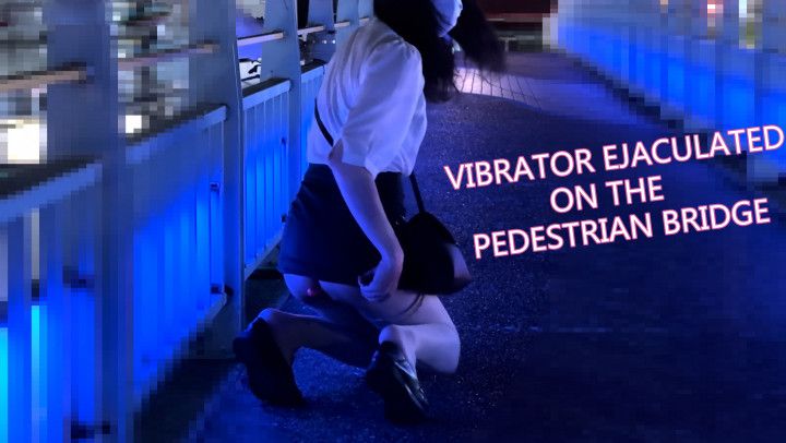 Exposed on the pedestrian bridge with vibrator ejaculated