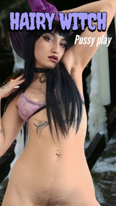 Goth witch plays with her hairy pussy