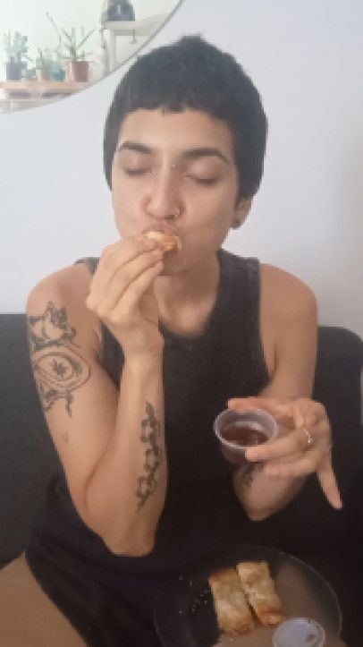 Eating fried dumplings