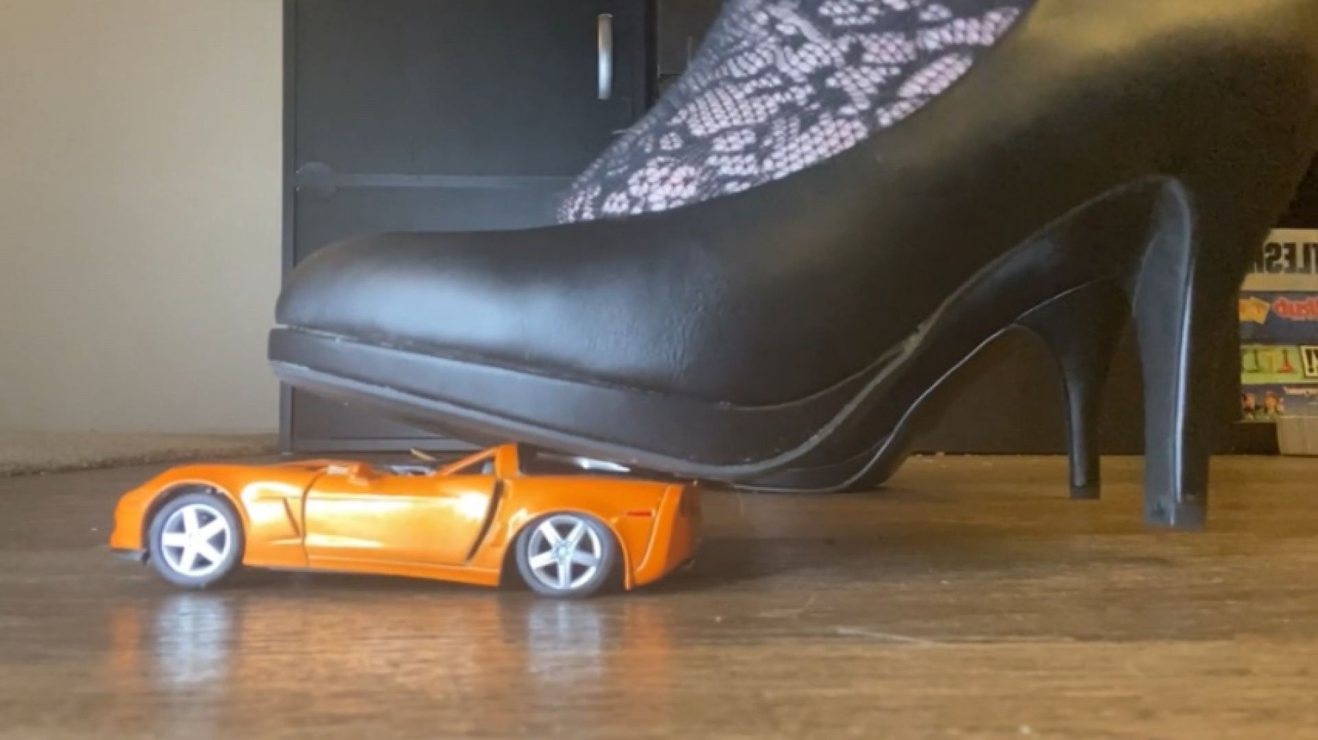 Orange Sports Toy Car Smash in Heels