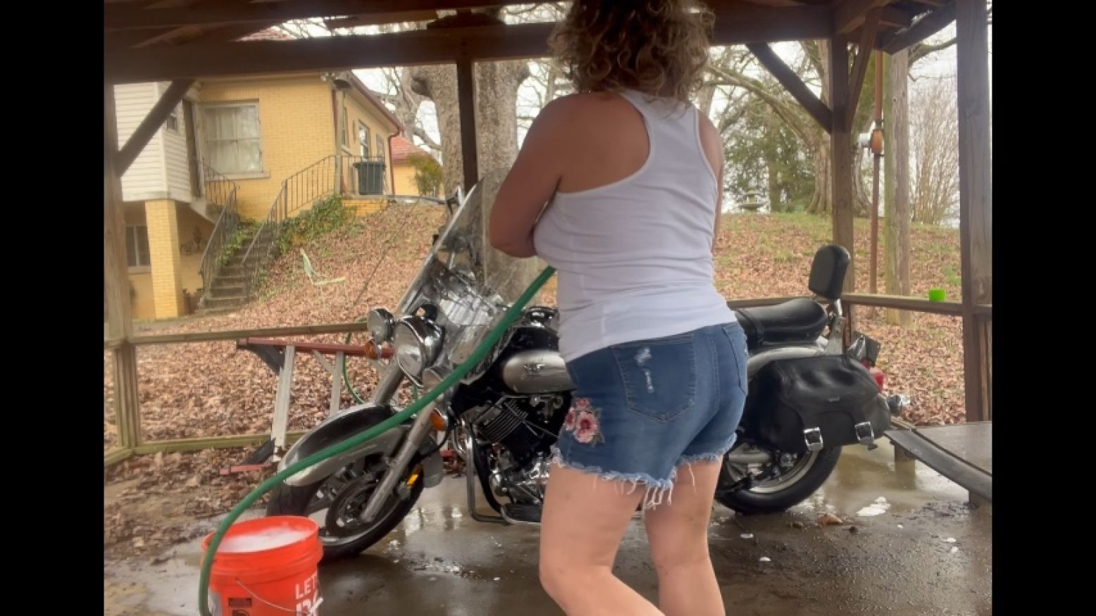 Non-sexual vid- MILF washes her motorcycle