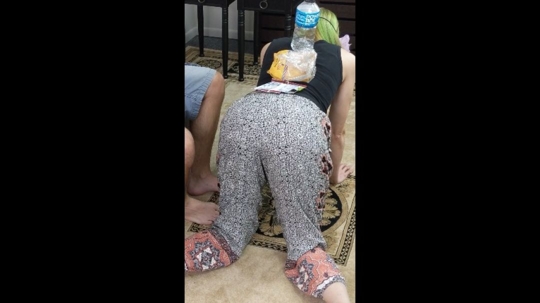 Husband Uses Wife as Foot Rest