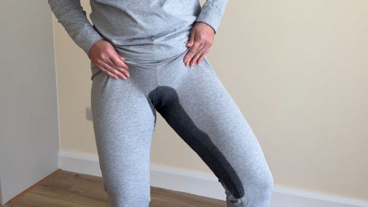 Girl wetting pee in pajamas pants desperate