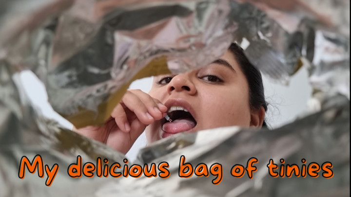Giantess eating a bag of tinies