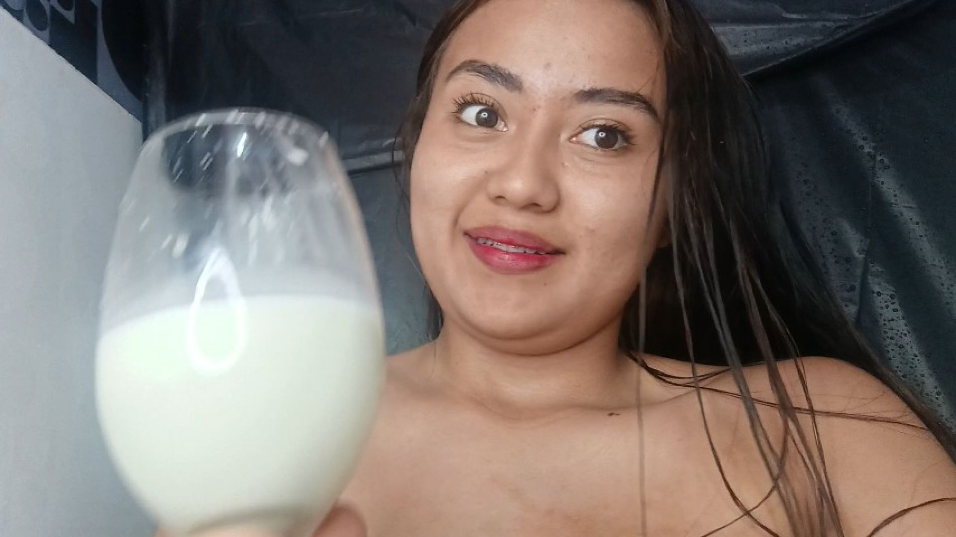 playing with my breastmilk -filled nipples