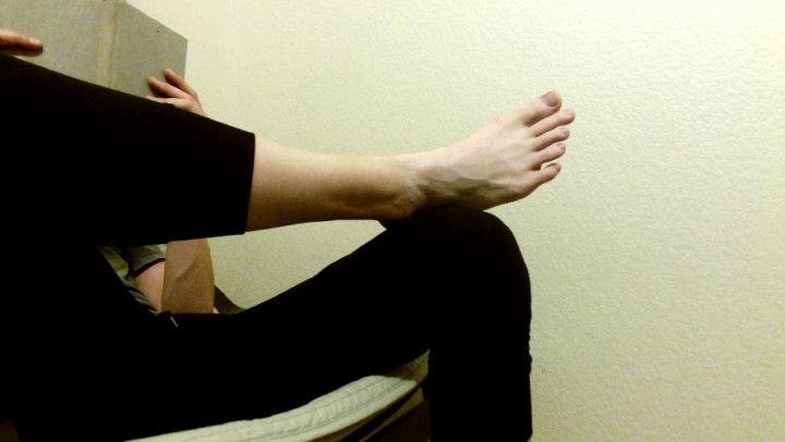 Feet Close Up While I Read an Old Book