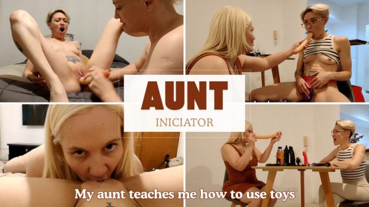 Step-AUNT with BIG BOOBS teaches LESBIAN how to use SEX TOYS