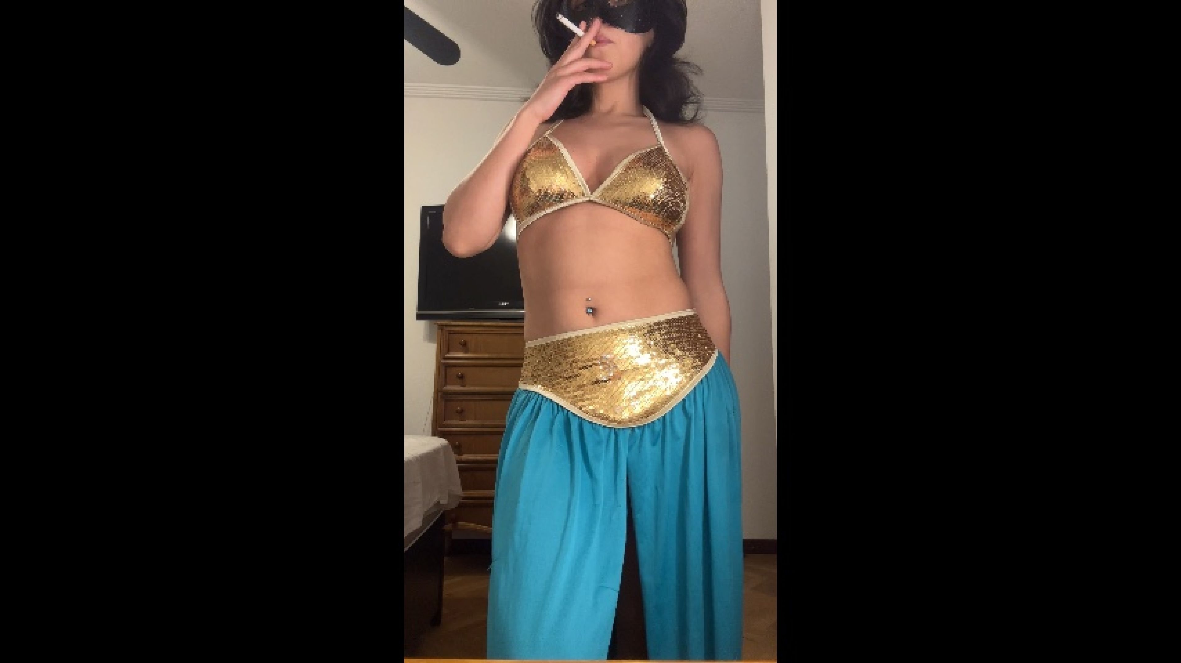 belly dancer smoking &amp; striptease