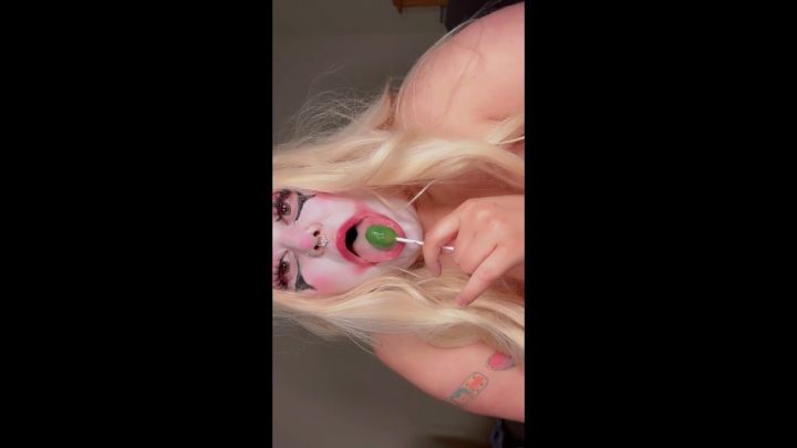 Sweet Tooth Seduction: A Clown's Lollipop Obsession