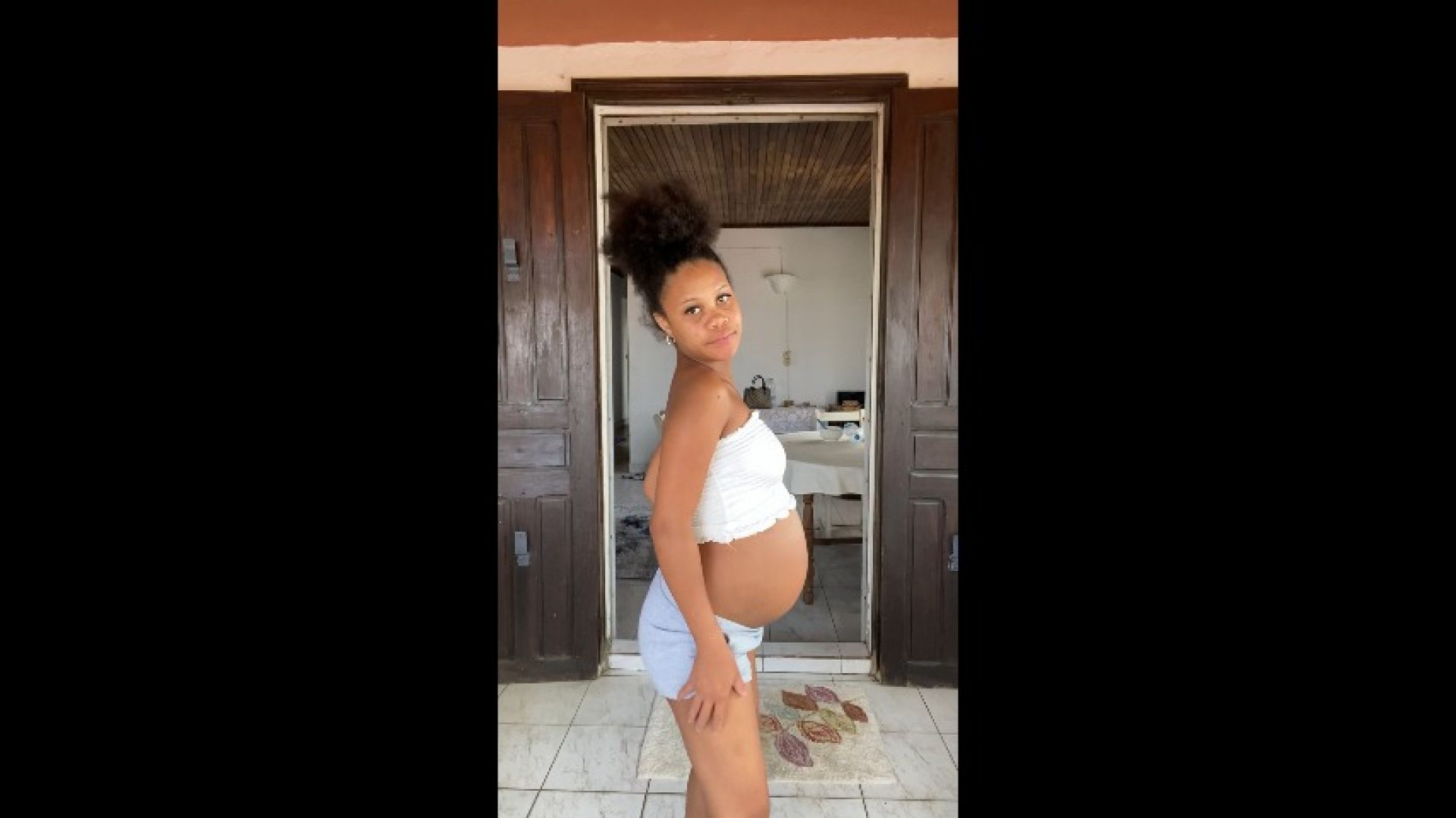 Pregnant black girl slowly undresses for you