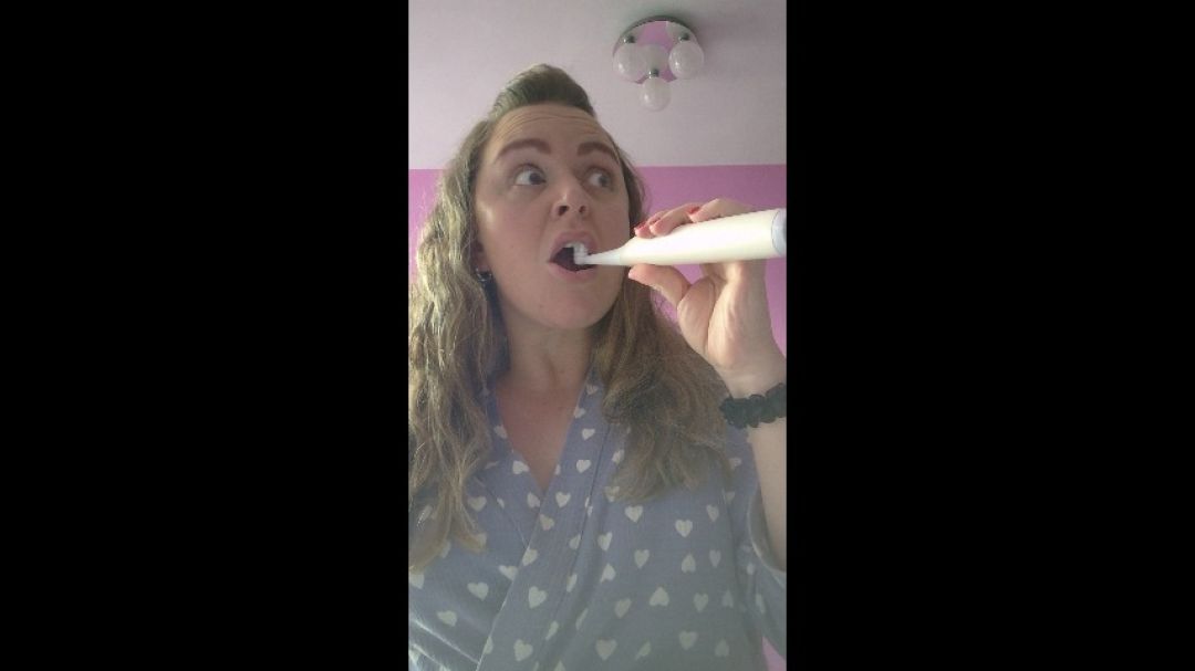 Brushing my teeth