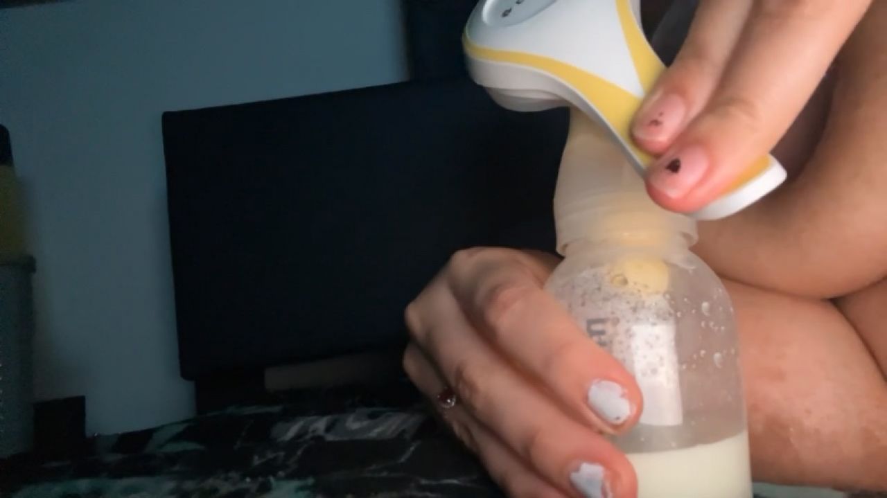 Pumping milk from big juicy titts